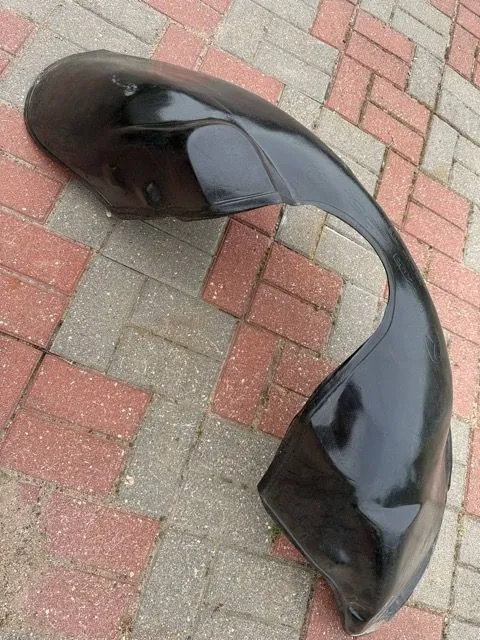 Защита крыла (подкрылок) передний левый Mazda 626 GF 1998-2002