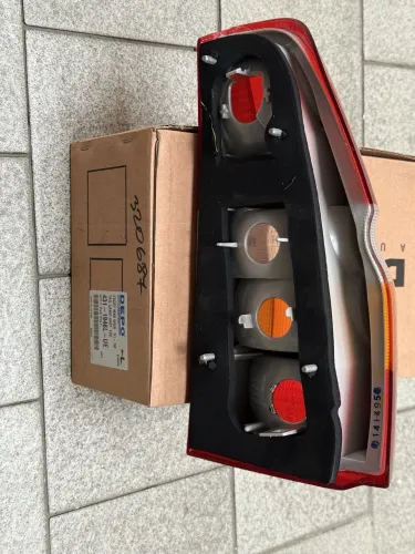 Фонарь задний левый к Ford Escort универсал 1990-1994