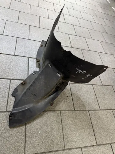 Защита крыла (подкрылок) передний левый Volkswagen Passat (B6) передняя часть